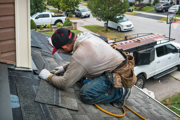 Professional Roofing technician working in Conway, NH